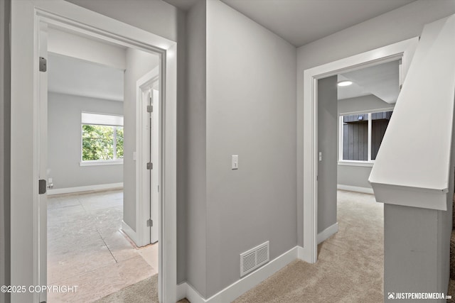 20218 Eagles Nest Ct, Eagle River, AK 99577 - hallway featuring light carpet
