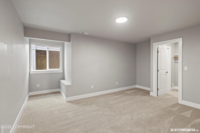 20218 Eagles Nest Ct, Eagle River, AK 99577 - empty room featuring light colored carpet and baseboards