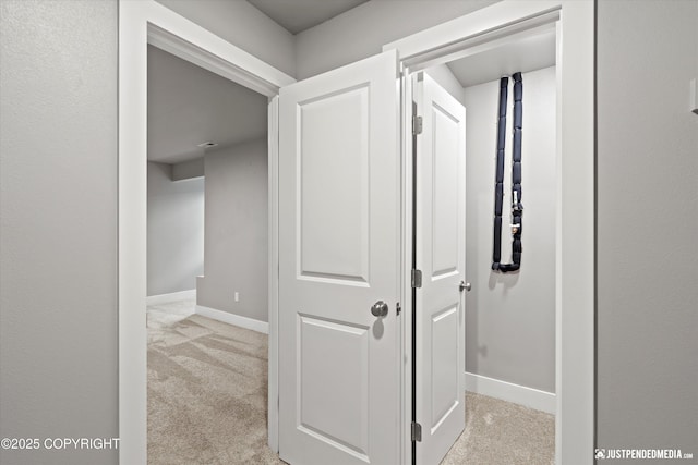 20218 Eagles Nest Ct, Eagle River, AK 99577 - corridor with light colored carpet