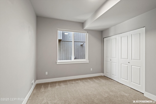 20218 Eagles Nest Ct, Eagle River, AK 99577 - unfurnished bedroom with carpet floors and a closet