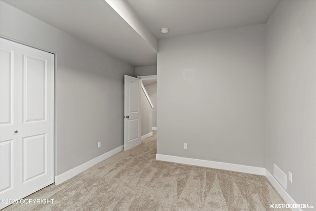 20218 Eagles Nest Ct, Eagle River, AK 99577 - unfurnished bedroom with carpet flooring and a closet