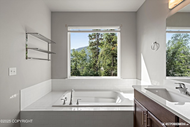20218 Eagles Nest Ct, Eagle River, AK 99577 - bathroom with vanity, a bath, and a mountain view
