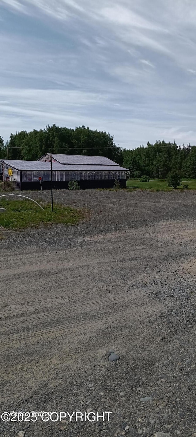 48105 Halverson Ave, Soldotna, AK 99669 - view of yard featuring dirt driveway