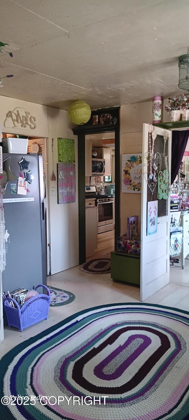 48105 Halverson Ave, Soldotna, AK 99669 - bedroom with freestanding refrigerator