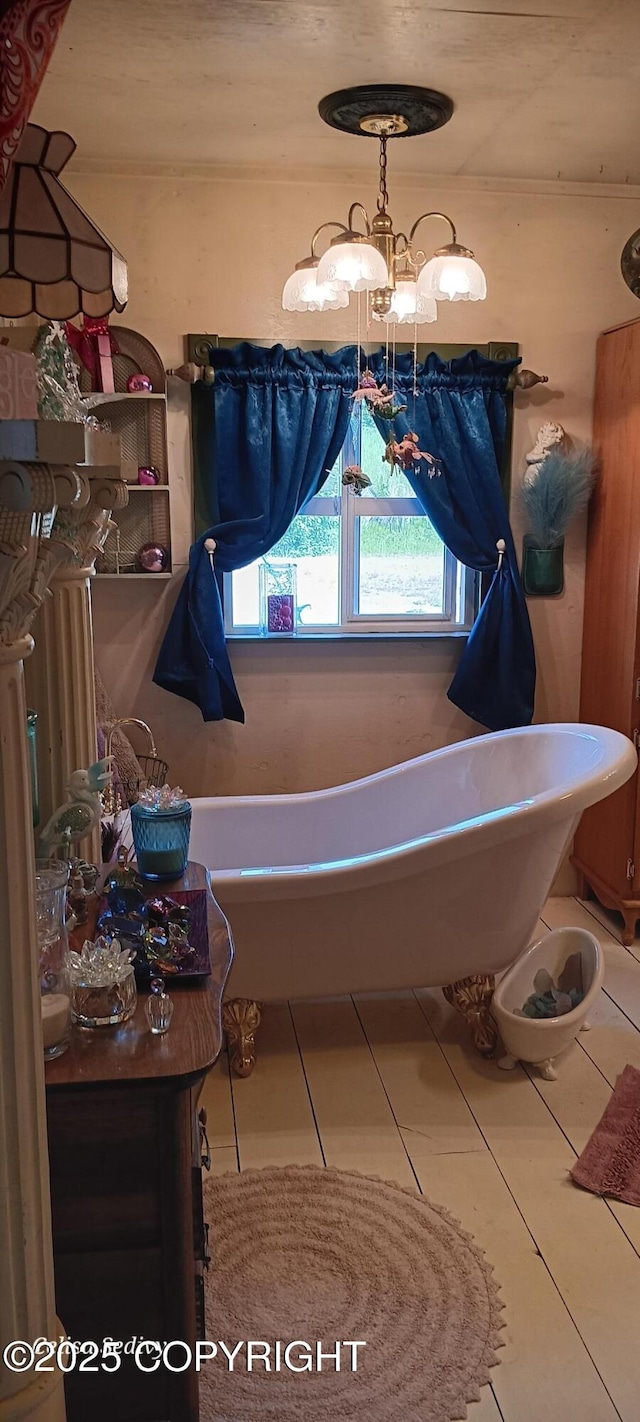 48105 Halverson Ave, Soldotna, AK 99669 - full bath with a soaking tub, tile patterned flooring, and a chandelier