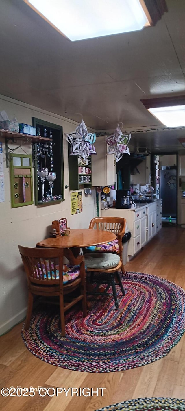 48105 Halverson Ave, Soldotna, AK 99669 - dining space with wood finished floors