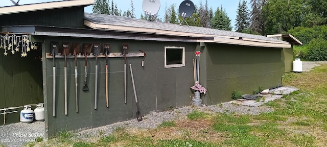 48105 Halverson Ave, Soldotna, AK 99669 - view of home's exterior featuring a shingled roof