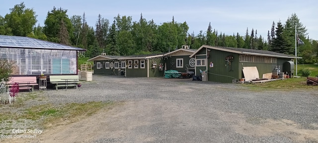 48105 Halverson Ave, Soldotna, AK 99669 - view of home's exterior featuring gravel driveway