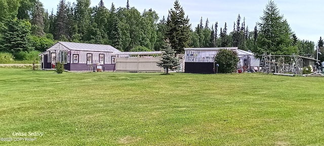 48105 Halverson Ave, Soldotna, AK 99669 - view of green lawn with an outbuilding