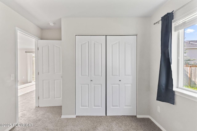 6218 Ophir Dr, Anchorage, AK 99504 - unfurnished bedroom featuring carpet flooring and a closet
