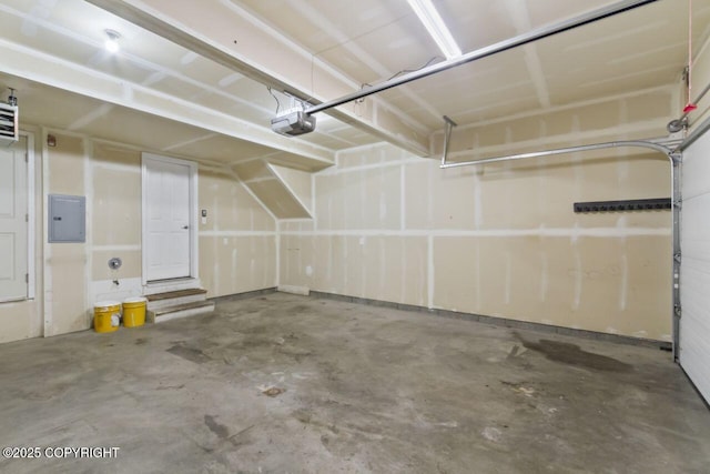 6218 Ophir Dr, Anchorage, AK 99504 - garage featuring electric panel and a garage door opener