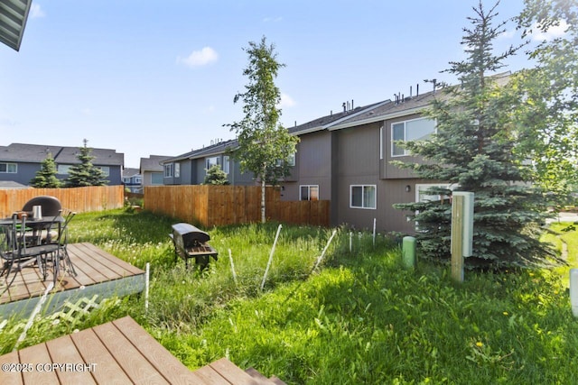 6218 Ophir Dr, Anchorage, AK 99504 - view of yard with outdoor dining area and a deck
