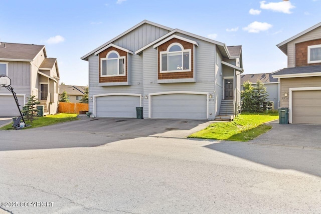 6218 Ophir Dr, Anchorage, AK 99504 - view of front facade featuring a garage and driveway