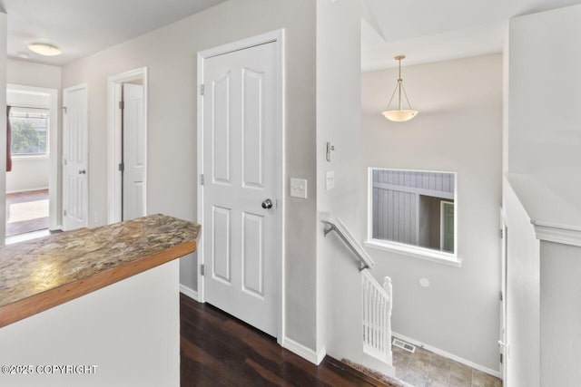6218 Ophir Dr, Anchorage, AK 99504 - corridor featuring baseboards and dark wood-style flooring