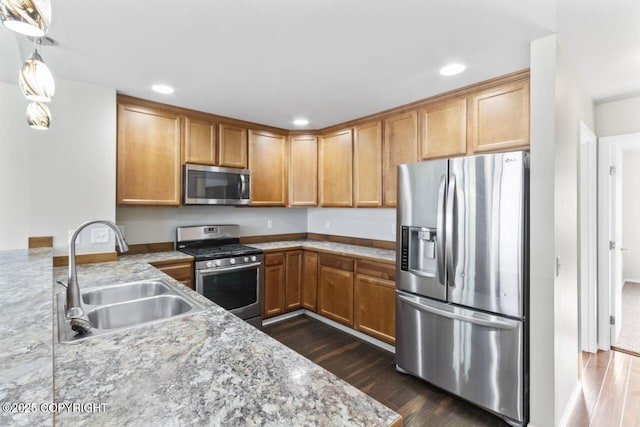 6218 Ophir Dr, Anchorage, AK 99504 - kitchen with stainless steel appliances, dark wood-style floors, recessed lighting, and decorative light fixtures