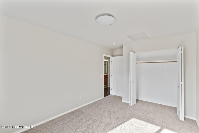 6218 Ophir Dr, Anchorage, AK 99504 - unfurnished bedroom featuring attic access, carpet floors, and a closet