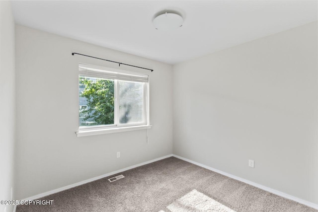 6218 Ophir Dr, Anchorage, AK 99504 - unfurnished room with carpet floors and baseboards