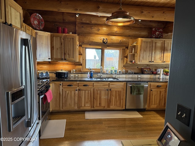 35605 Kalifornsky Beach Rd, Kenai, AK 99669 - kitchen featuring appliances with stainless steel finishes, rustic walls, open shelves, dark wood-style floors, and dark stone counters