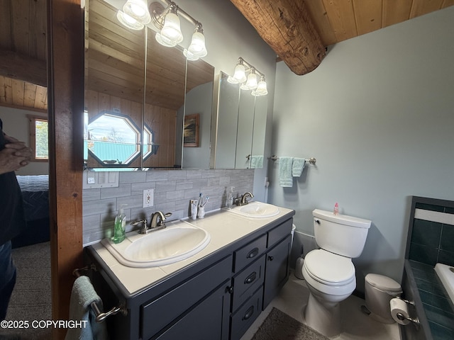 35605 Kalifornsky Beach Rd, Kenai, AK 99669 - full bath with wooden ceiling, double vanity, decorative backsplash, and a relaxing tiled tub