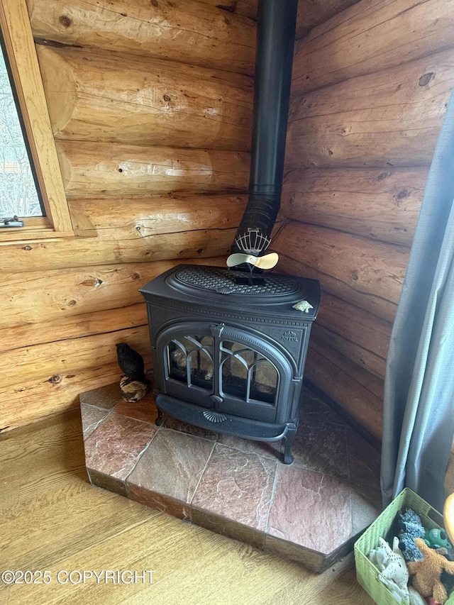 35605 Kalifornsky Beach Rd, Kenai, AK 99669 - detailed view of a wood stove and log walls