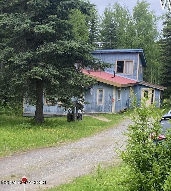 9025 W Alice Ann Ln, Wasilla, AK 99654 - view of front facade featuring dirt driveway