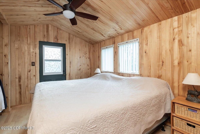 1685 Taroka Dr, Fairbanks, AK 99709 - bedroom with wooden walls, wooden ceiling, vaulted ceiling, and wood finished floors