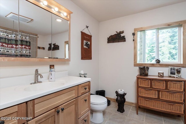 1685 Taroka Dr, Fairbanks, AK 99709 - bathroom featuring vanity, tile patterned flooring, and curtained shower