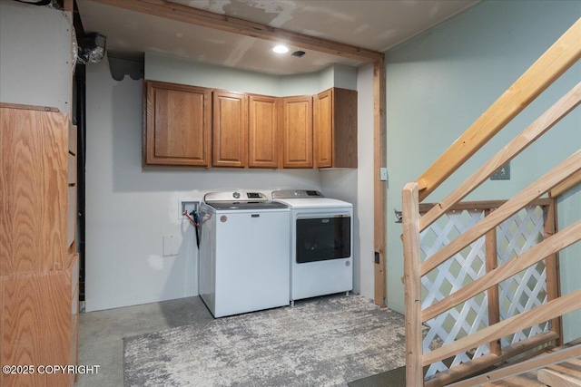 1685 Taroka Dr, Fairbanks, AK 99709 - washroom with cabinet space and separate washer and dryer