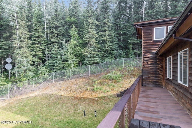 1685 Taroka Dr, Fairbanks, AK 99709 - fenced backyard with a forest view