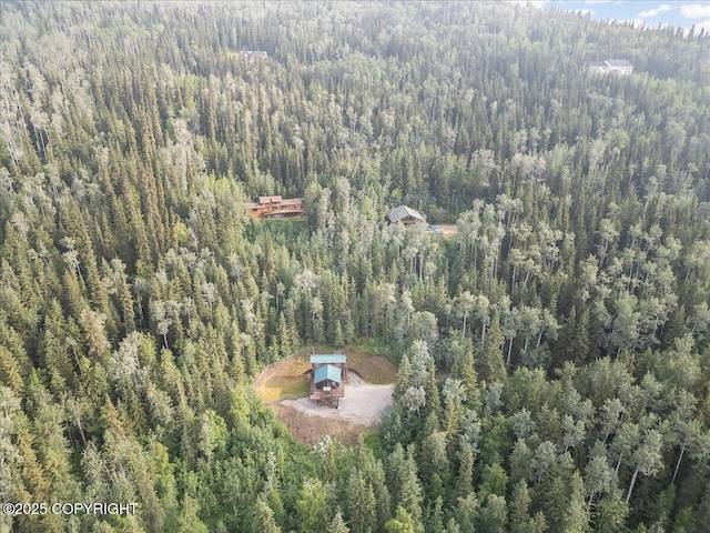 1685 Taroka Dr, Fairbanks, AK 99709 - view of subject property with a heavily wooded area