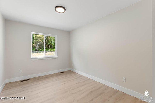 1401 E Holland Ave, Wasilla, AK 99654 - spare room featuring light wood-type flooring