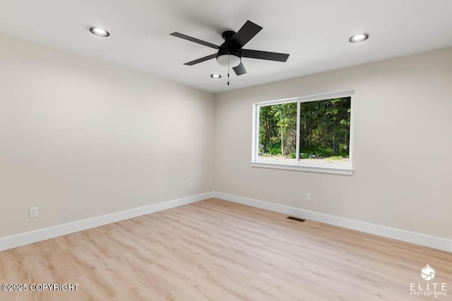 1401 E Holland Ave, Wasilla, AK 99654 - empty room featuring wood finished floors, recessed lighting, and a ceiling fan