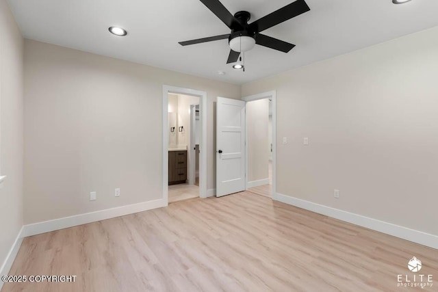 1401 E Holland Ave, Wasilla, AK 99654 - unfurnished bedroom with light wood finished floors, ensuite bath, recessed lighting, and ceiling fan