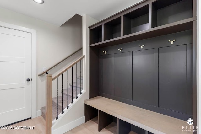 1401 E Holland Ave, Wasilla, AK 99654 - mudroom featuring baseboards and light wood-style flooring