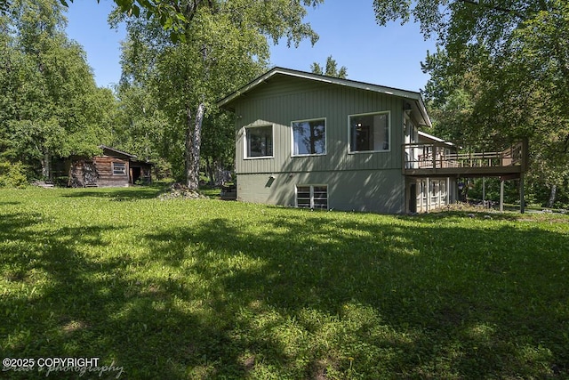 15021 Old Seward Hwy, Anchorage, AK 99516 - rear view of property featuring a yard and a wooden deck