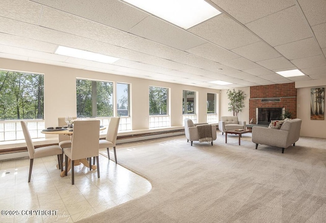 15021 Old Seward Hwy, Anchorage, AK 99516 - dining room featuring a baseboard radiator and a fireplace