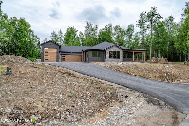 1770 S Corwin Ln, Wasilla, AK 99654 - view of front facade with driveway and an attached garage