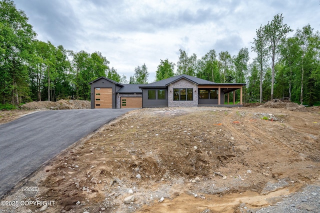 1770 S Corwin Ln, Wasilla, AK 99654 - view of front facade featuring driveway and an attached garage