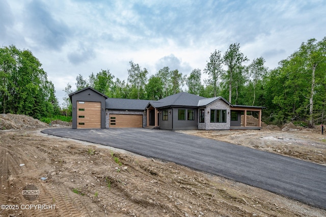 1770 S Corwin Ln, Wasilla, AK 99654 - view of front facade with an attached garage and asphalt driveway