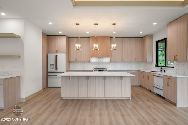 1770 S Corwin Ln, Wasilla, AK 99654 - kitchen with high end fridge, light brown cabinetry, a center island, open shelves, and light wood-style floors