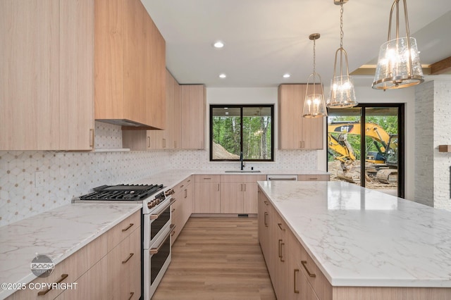1770 S Corwin Ln, Wasilla, AK 99654 - kitchen featuring light brown cabinets, double oven range, modern cabinets, a chandelier, and recessed lighting