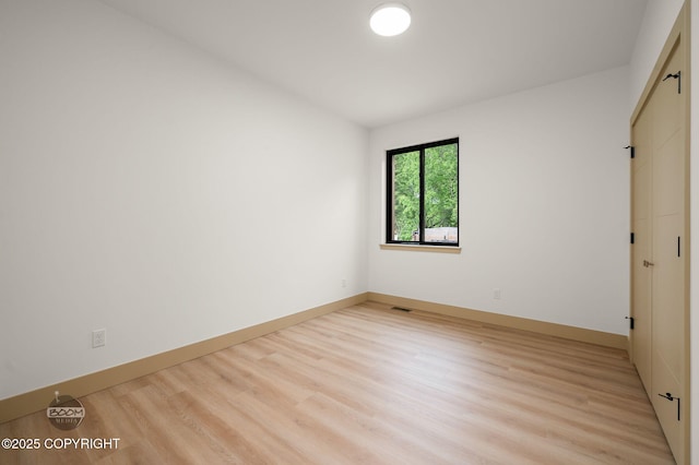 1770 S Corwin Ln, Wasilla, AK 99654 - empty room with light wood-style floors and baseboards