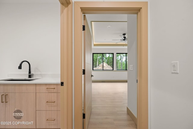 1770 S Corwin Ln, Wasilla, AK 99654 - hall with a sink and light wood-style floors