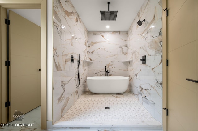 1770 S Corwin Ln, Wasilla, AK 99654 - bathroom featuring marble tiled flooring, tile walls, a marble finish shower, and a freestanding tub