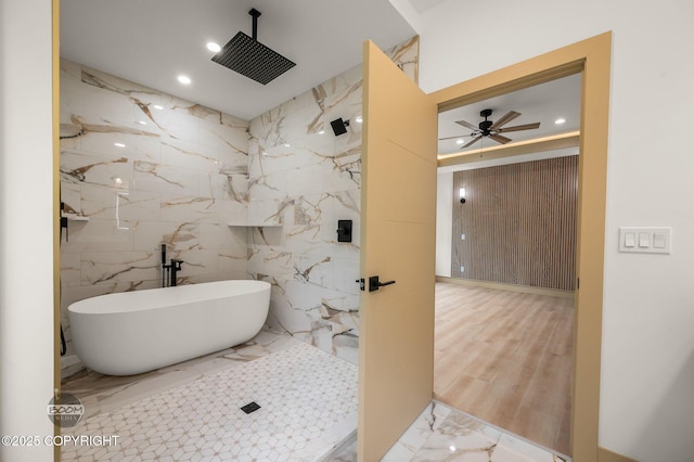 1770 S Corwin Ln, Wasilla, AK 99654 - full bath featuring a soaking tub, a marble finish shower, marble tiled flooring, a ceiling fan, and recessed lighting