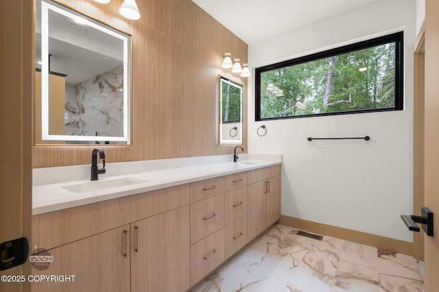 1770 S Corwin Ln, Wasilla, AK 99654 - bathroom with double vanity, marble look tiles, and a marble finish shower