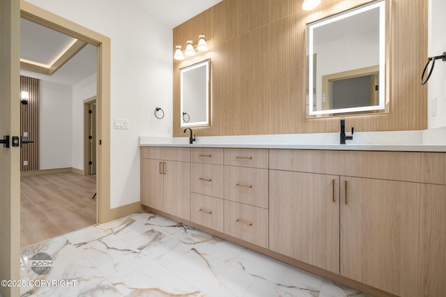 1770 S Corwin Ln, Wasilla, AK 99654 - bathroom with double vanity and marble look tile flooring