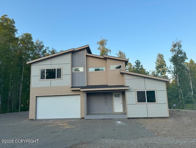 7075 S Brimstone Dr, Wasilla, AK 99654 - modern home featuring an attached garage
