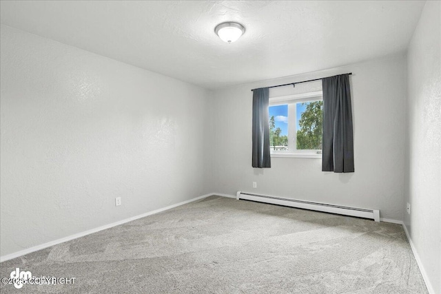 8203 Duben Ave, Anchorage, AK 99504 - spare room featuring baseboard heating and carpet flooring