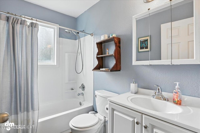 8203 Duben Ave, Anchorage, AK 99504 - full bathroom featuring a textured wall, shower / bath combo, and vanity